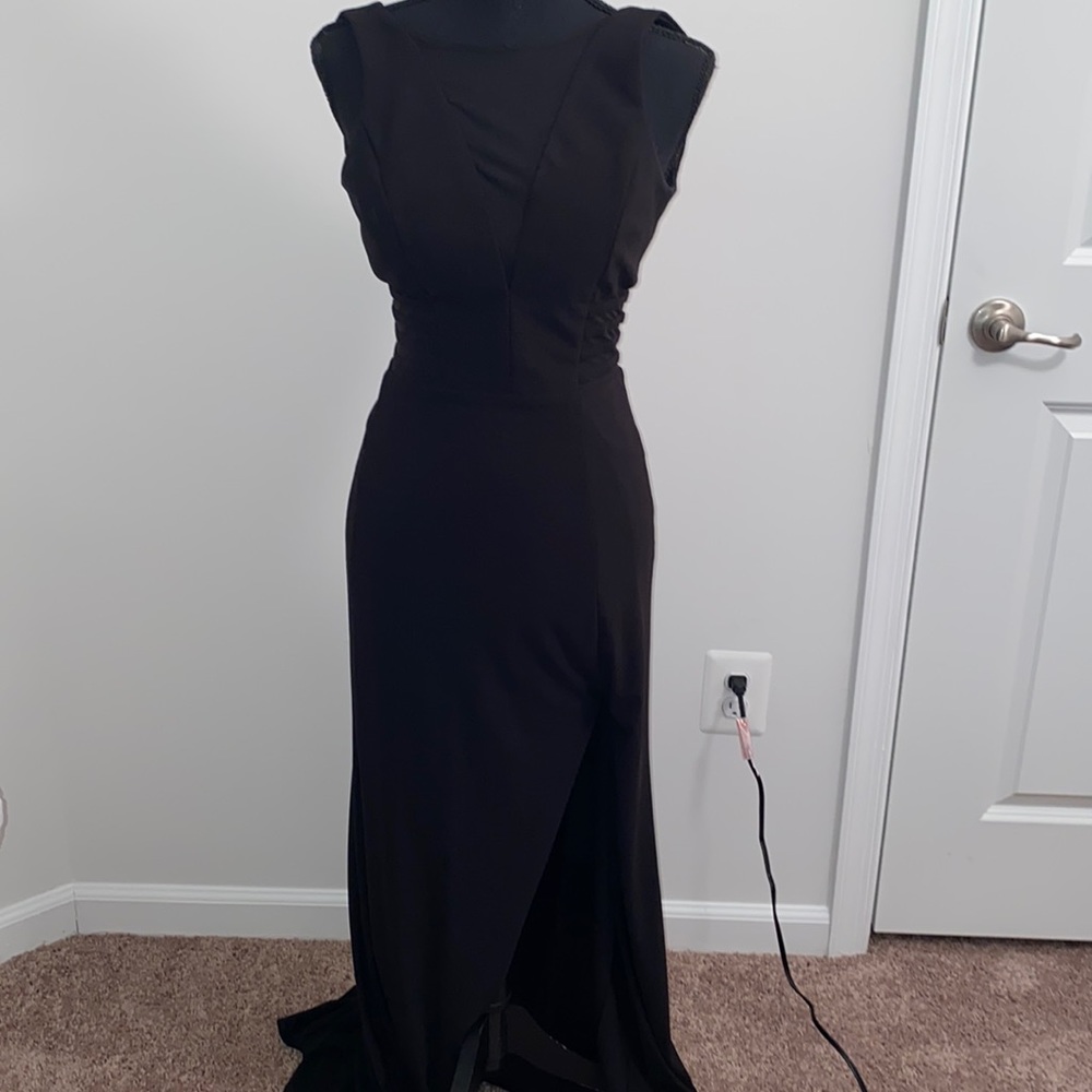 Long Black Dress with High Slit on Left Leg.